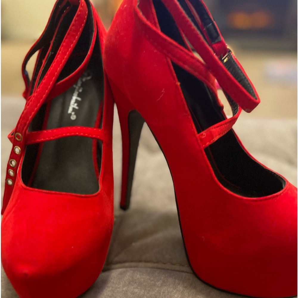 Sassy red heels I was saving for a special occasion never worn size 7.5